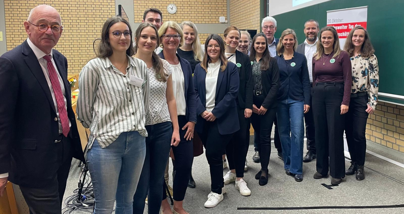 Teilnehmer und Sprecher des TdG 2024 posieren zusammen